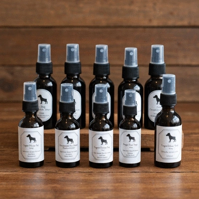 Assortment of homemade dog freshness sprays in dark glass bottles